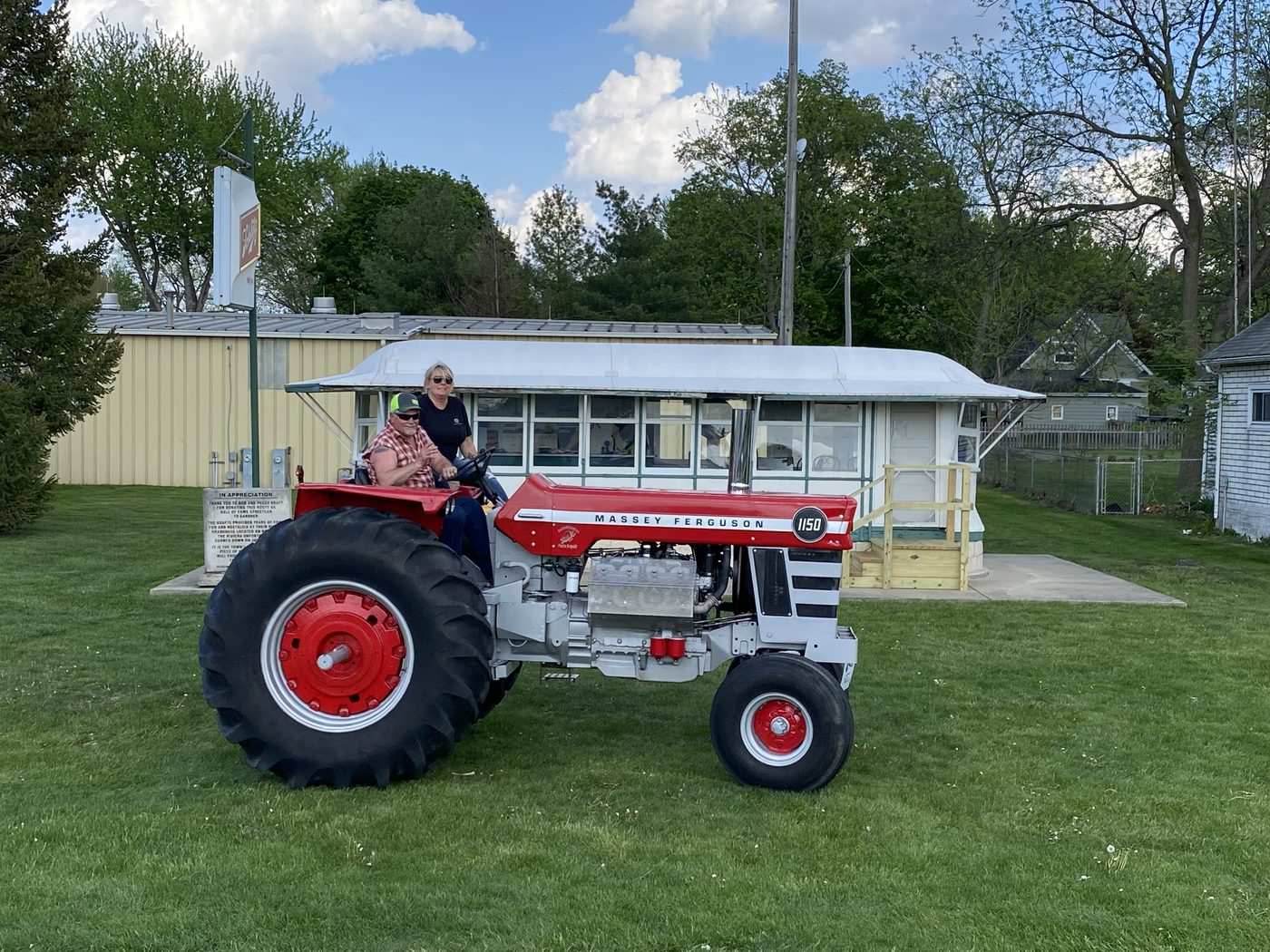 Massey Ferguson 1150 tractor at the Gardner Tractor Show with Riviera Diner Car in background